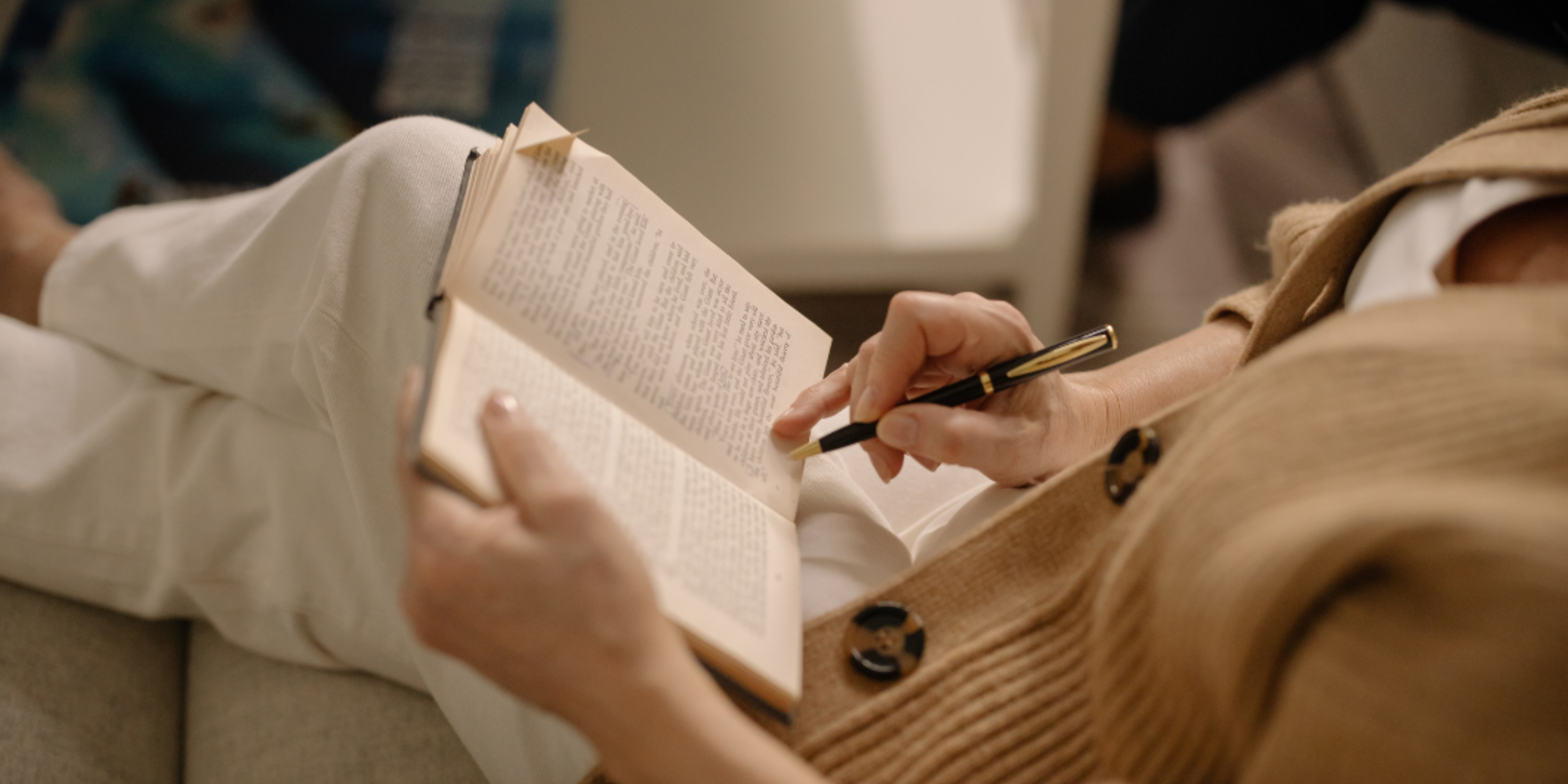 yoga student reading and taking notes